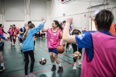 Special Olympics Europe Eurasia Youth Leaders playing in a game of Unified basketball.