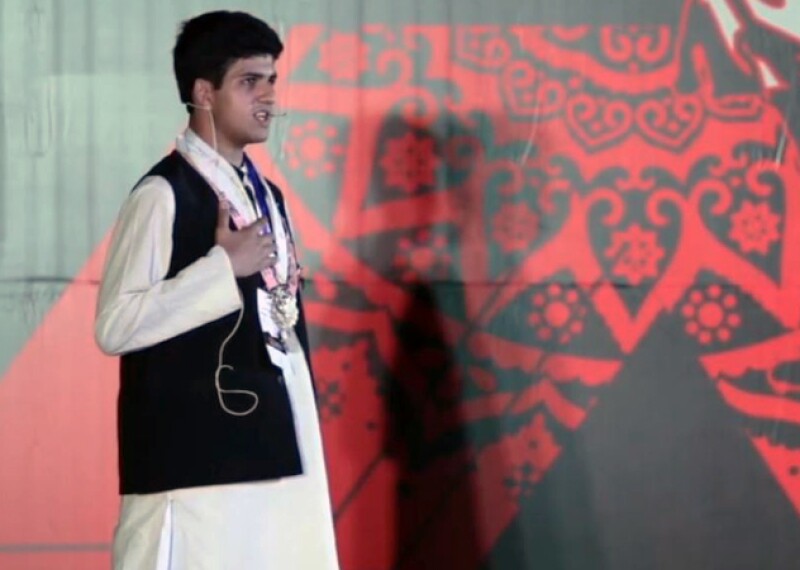 haseeb abbasi on stage at TEDX Lahore.