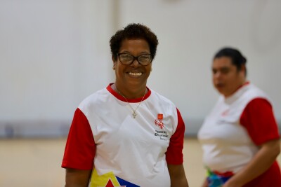 Special Olympics Bonaire female athlete smiles at the camera