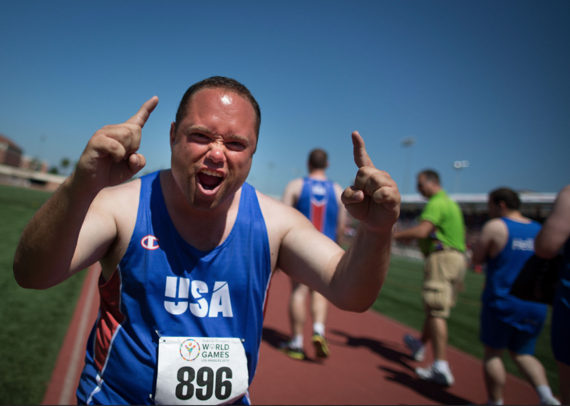 Athlete celebrating on the field. 