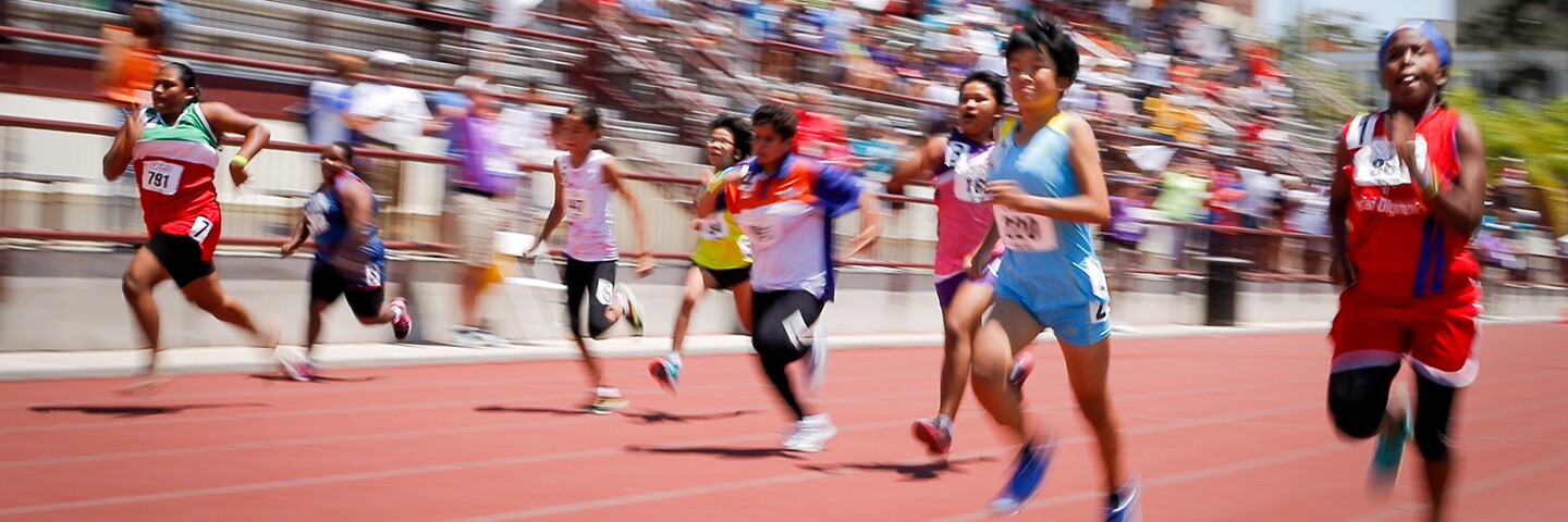 Athletes running on a track