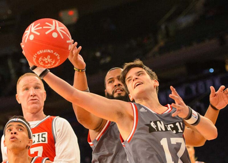 Special Olympics Belgium athlete Cedriek Beerten (No. 17) reaches for the ball during the 2015 NBA Cares Unified Basketball Game at Madison Square Garden in New York City.