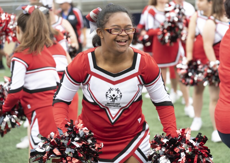 Special Olympics Cheerleader smiling