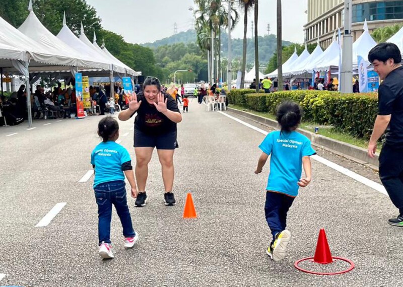 Two young athletes finishing a course. 